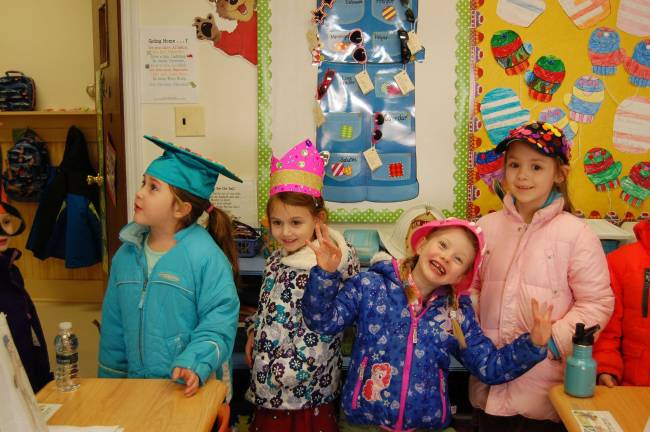 Celebrating the 100th day of school at Ringwood Christian Kindergarteners modeling their “100 Day Hat”