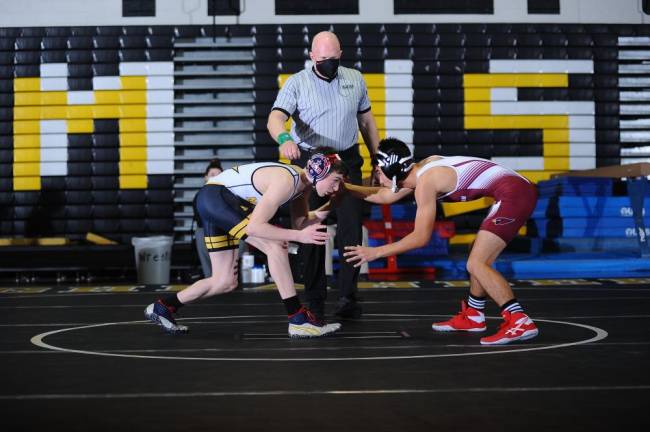 Sophomore Colin Menier, left. Photos provided by West Milford Wrestling Coach Taylor Pevny.