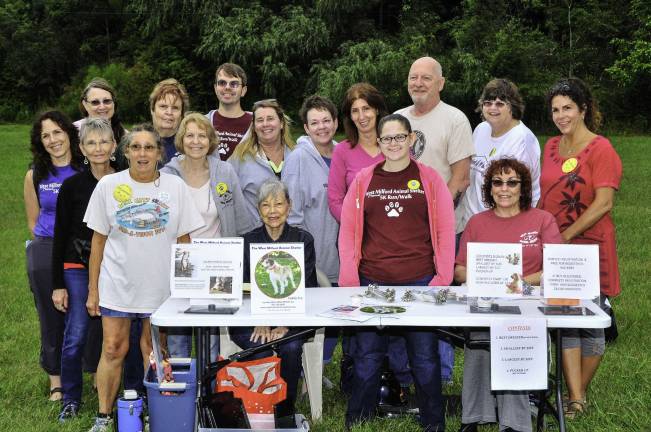 Sun shines on the dog walkers The shelter is 100 percent volunteer. Bravo for another successful event.