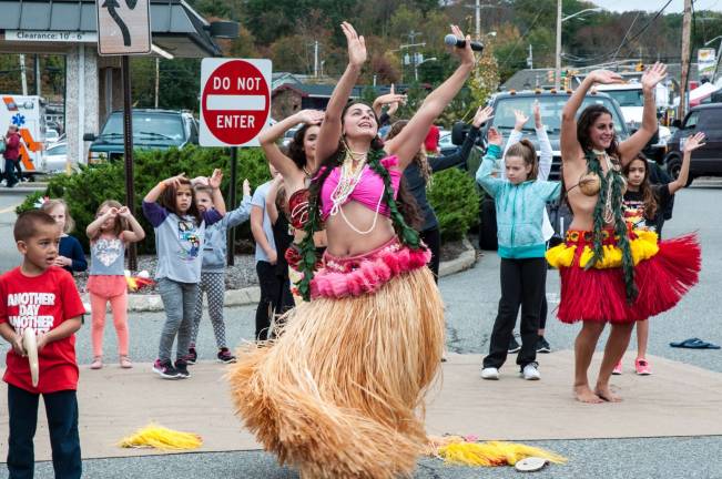 Township chalks up another great Autumn Lights Festival Children learn to do traditional Hawaiian dances at the Autumn Lights Festival in West Milford. photo by mark Cranston