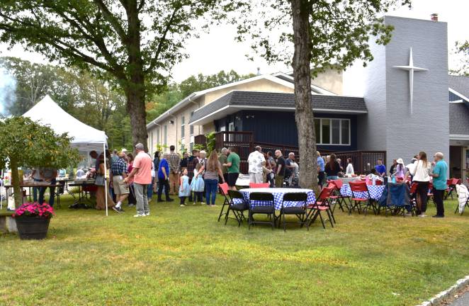 Church celebrates centennial CH1 Parishioners celebrated the centennial of the Almond Branch at a picnic Sept. 7. (Photos by Fred Ashplant)