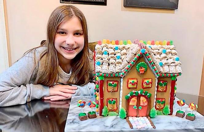 Gingerbread houses delight the judges Ava Papageorge, third place kit, ages 9-12