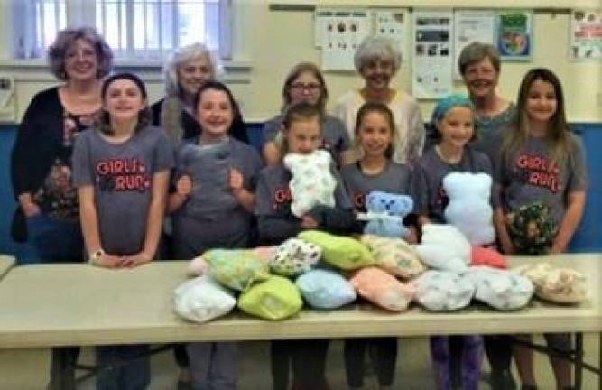 Club makes Teddy Bears to comfort children during emergencies
