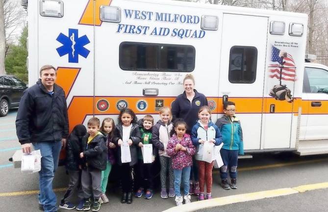 Before schools shut down, kindergarten students of the Maple Road Youth Act Club spent Thursday afternoon, March 12, making Thank you survival snack kits for first responders of West Milford First Aid Squad. They drew and colored pictures on lunch bags and then fill them with a variety of snacks, to help them keep going. Then, they attached a note explaining why the first responders are appreciated. When they were done, they handed them to two volunteers of the West Milford First Aid Squad. At the end, they were kind enough to let the kids check out the ambulance.