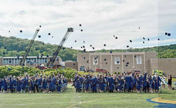 Photos: Jefferson Township High School graduation The Jefferson Township High School graduates toss their caps in the air at the end of the ceremony Friday, June 20. (Photos by Denise von Wilke)