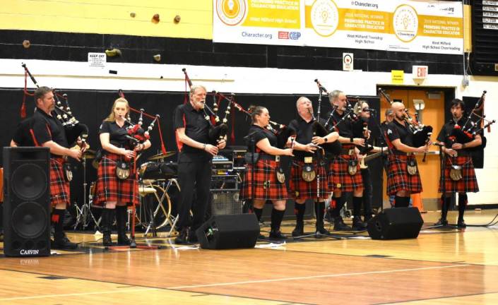 The Bergen County Firefighters Pipe Band performs.