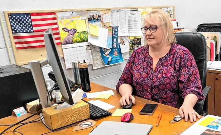 Full schedule for full-time mayor Mayor Michele Dale at work in her office in the municipal building.