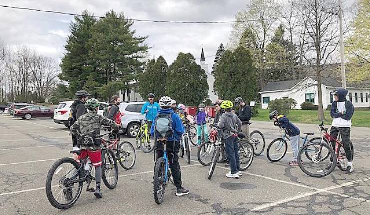 Scouts of Our Lady Queen of Peace Troop 159 learn about the rules of the road before heading off on their trek. Photos provided by Nicholas Salleroli.