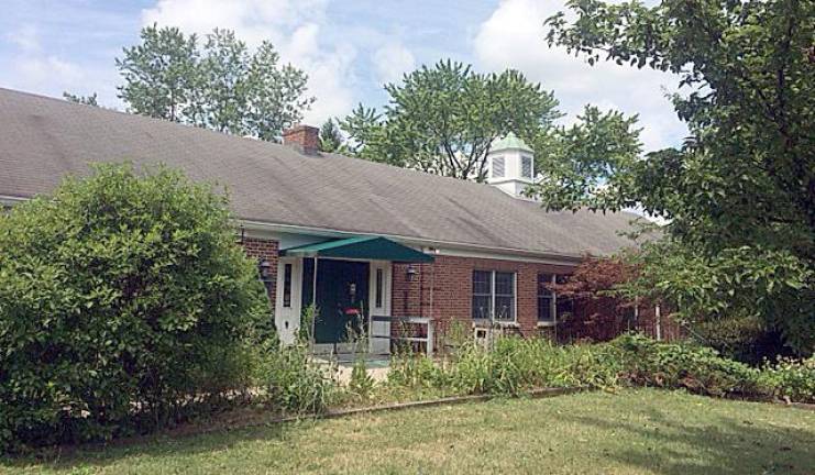 Nothing new appears to be happening yet in the shuttered old West Milford Library building as seen here on July 13 but look for renovation work to begin as soon as a conceptual plan and work contracts are approved. Photo by Ann Genader.