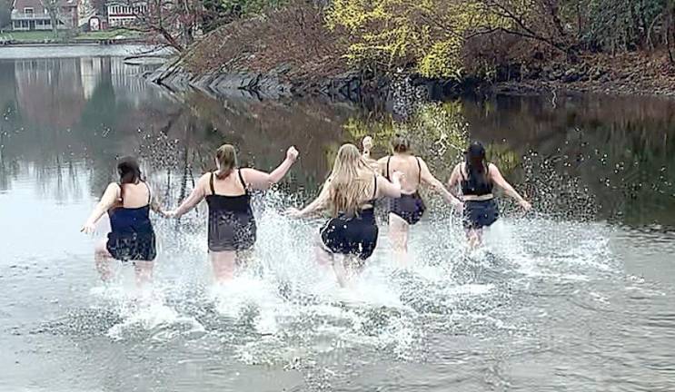 A cold, wet day in West Milford didn’t keep the WM Special Olympics coaches from gathering at Mt. Glen Lakes to participate in Special Olympics New Jersey’s “virtual” 2021 Polar Bear Plunge. Provided photos.