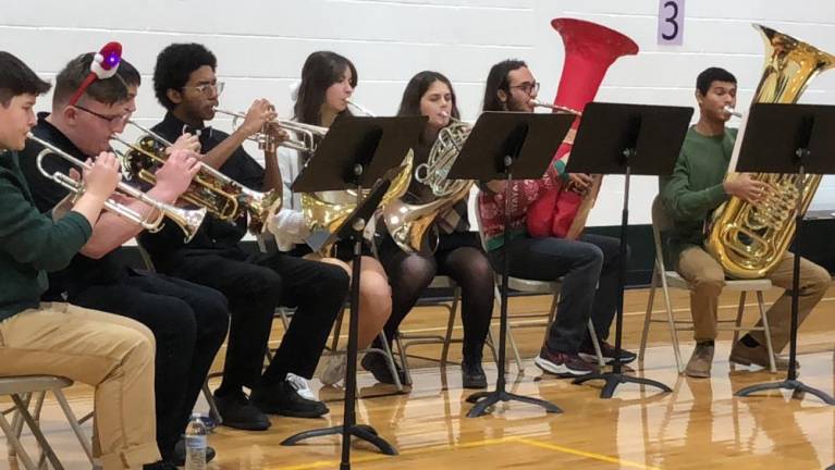 Choir, band entertain seniors Some members of the West Milford High School Wind Ensemble dressed for the holiday.