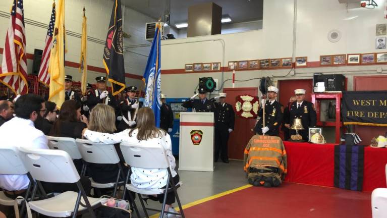 Edward Steines’ jacket and helmets were placed at the front of the room during the service.