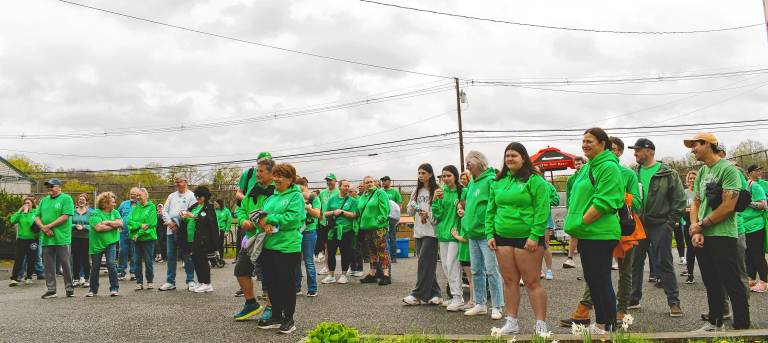 Photos: 16th annual Irish Whisper Walk Participants listen to Kane family members before the walk.