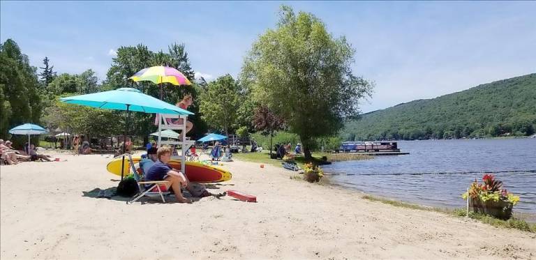 The beach at the Pinecliff Lake Club.