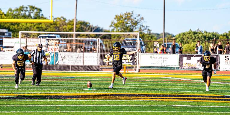 West Milford defeats Paramus, 44-13 Senior kicker Braden Amundson kicks the ball. (Photo by TJ Nolan)