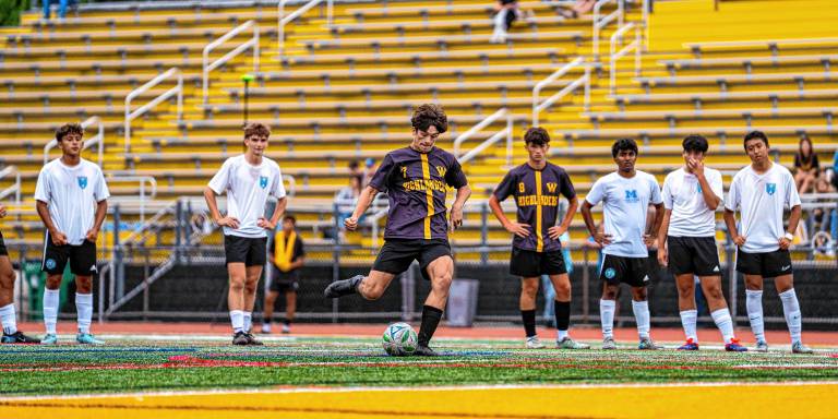 Sports roundup: Highlanders aim to build on success Senior Will Dent takes a penalty kick.
