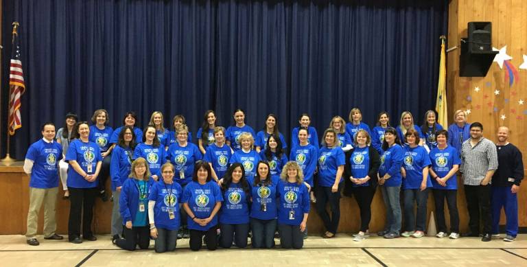 District 'lights it up blue' for autism awareness Upper Greenwood Lake staff were all in for autism awareness.
