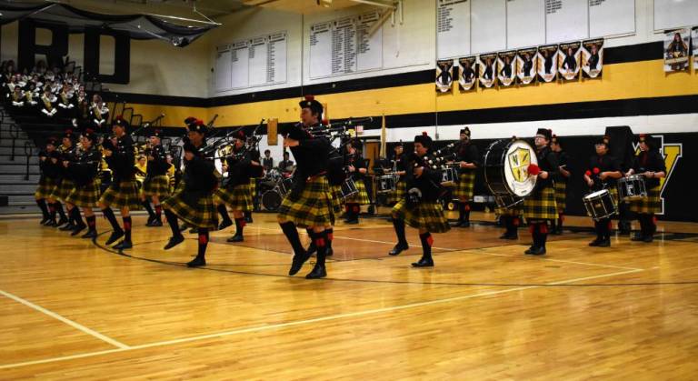 The West Milford Pipe and Drums perform during the 23rd annual Military Concert &amp; Tattoo in the school gym. (Photos by Fred Ashplant)