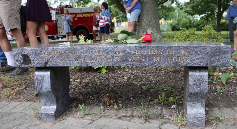 'Find that unity again' Each bench in the park honors one of the victims of the attack.