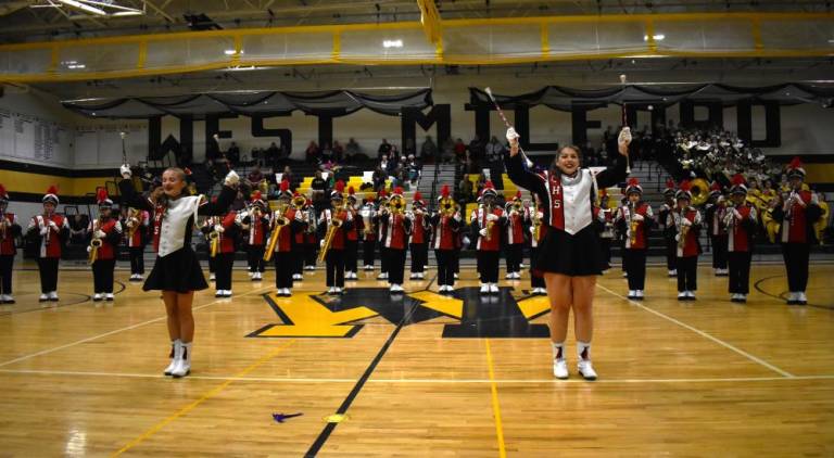 The Clifton High School marching band performs.