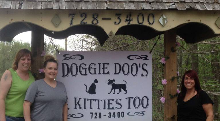 From left, Allison Kern, Beth Telford and owner Lisa Mitchell are the staff at Doggie Doo's and Kitties Too.