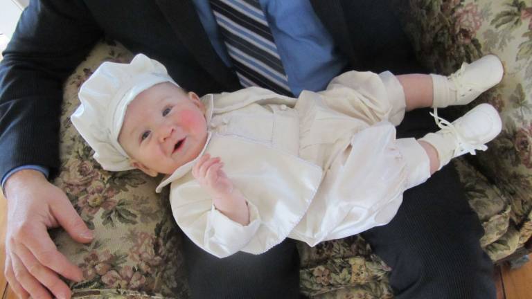 Oh Baby it's Spring! Baby Photo Contest Photo, Brian Ciffo of Glen Rock "Bryce John Ciffo at 6 months old relaxing on his daddy's lap while waiting for his Baptism party to begin."