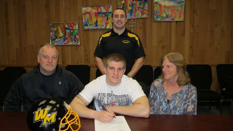Wesley Pierce signs with East Stroudsburg Photo by Patricia Keller Wesley Pierce, center, signed a letter of intent to play football with East Stroudsburg University. His parents, Todd and Kathy are on either side of him and his West Milford football coach, Don Dougherty, stands behind him.