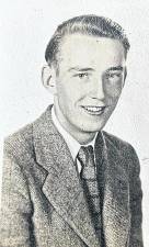 John Andrew Dearing is celebrating his 100th birthday on October 18. He is pictured in 1945 when he graduated from Butler High School.