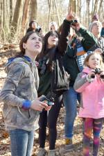 Veronica Klenk, intern educator at the New Weis Center for Education, Arts &amp; Recreation, points to a bird during the Great Backyard Bird Count event Saturday, Feb. 18 at the center in Ringwood. At left is Alexandrea ‘Xander’ Warren, 11, of West Milford and Emily Raupp, 9, of Ramsey is at right. (Photos by Rich Adamonis)