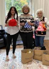 The Woman’s Club of West Milford recently knitted 60 winter hats for distribution to young West Milford children via the Highland Family Success Center. Photo provided by Pat Spirko.