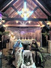 Our Lady Queen Peace holds live nativity