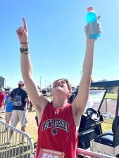 Michael McCloskey in his moment of triumph at a recent track and field event.