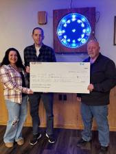 From left, Gina Mantz, fundraiser co-chair, Tim Kelley, Rich Otis Asmus, fund raiser co-chair.