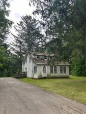 The house where Frank Sell grew up, on Macopin Road at the corner of Maple Road, recently was put on the market. (Photo by Ann Genader)