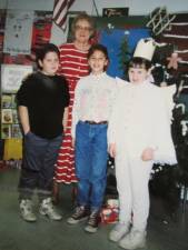 Marshall Hill School students with teacher Beth Schumm in 1994 tell about German Christmas customs.