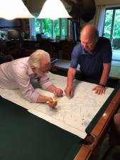 Greenwood Commission Chair Paul Zarrillo and West Milford Environmental Commission Chair Steve Sangle study maps to determine access points along Belcher&#x2019;s Creek as part of a recreation project. Photo Courtesy GL Commission