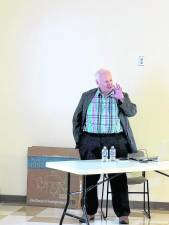 Kerry O’Brien speaks at the West Milford Library on June 30.