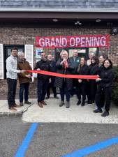 Mayor Michele Dale cuts the ribbon at the grand opening of Family &amp; Implant Dentistry at 1467 Union Valley Road on Friday, March 22. Dentist Harsh Shah previously worked at Ringwood Family Dental. He earned a bachelor’s degree in biomedical engineering at Stevens Institute of Technology and a dental degree at Rutgers School of Dental Medicine. He also studied comprehensive dentistry with an emphasis on cosmetic and implant dentistry at Hackensack University Medical Center. (Photo by Angela Kubisky)