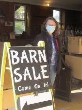 Barn organizer Donna Traylor invites shoppers to cash in on extreme bargains (Photo by Janet Redyke)