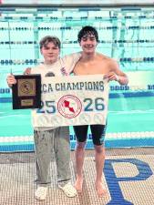 Sophomore Tristan Roer, left, of High Crest Lake in West Milford, contributed points in all three championships, swimming the breaststroke, butterfly, and relay poses alongside fellow teammate and butterfly/freestyler Nicholas Villalobos.