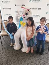 Children pose with the Easter Bunny at an April Fools’ Family Fun event Saturday, April 1 at the Upper Greenwood Lake Clubhouse.