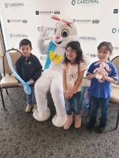 Children pose with the Easter Bunny at an April Fools’ Family Fun event Saturday, April 1 at the Upper Greenwood Lake Clubhouse.