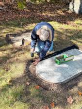West Milford Presbyterian Church members restore tombstones. (Photos by Denise von Wilke)