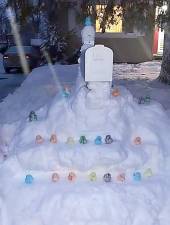 When Christine Lucas came home from a three-day long work shift as a pediatric hospital nurse (due to the snowstorm) ,she was greeted by this display of rainbow-colored duckie snowballs around her mailbox. The creations were made by her children Jess and Aidan to welcome her back home and to brighten her day. Photos provided by Christine Lucas.