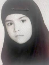 Mehrsa Baradaran was 9 years old when she was admitted to the United States as a refugee from Iran. This photo is from her Visa. She and her family were permitted to leave Iran in 1986 and immigrate to the United States. Mehrsa didn’t speak a word of English when she arrived - Farsi was her first language - but quickly picked up it up with the help of television in America. Provided photos.
