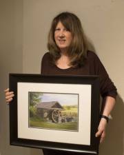 The artist with one of her creations Photo provided