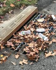 West Milford residents are asked to remove leaves and other debris gathered in storm drains to reduce weather-related problems. Provided photo.