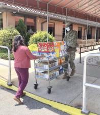 Most months, Catholic Charities, Diocese of Paterson gives out food to 5,000 – 7,000 people at these locations. In April, this number practically doubled, helping over 11,000 individuals in need. Provided photos.