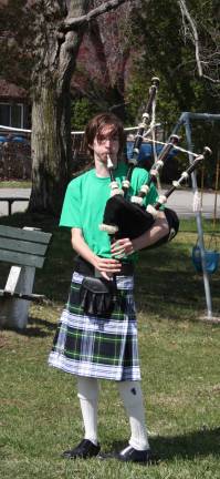 Musician Jonathan Standish piped the walkers through the gate at the beginning of the walk around the lake roads. Standish is a former student of Danny Kane at Macopin School in West Milford.