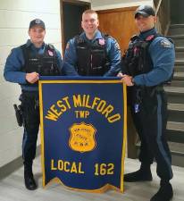 In conjunction with PBA #162, West Milford Police officers sported pink Breast Cancer Awareness Badges during the month of October. Pictured from left to right are: Ptl. Shane Lepore, Ptl. Michael Weber (PBA Vice President) and Ptl. Derek Finley. Photo provided by Janice Marion.